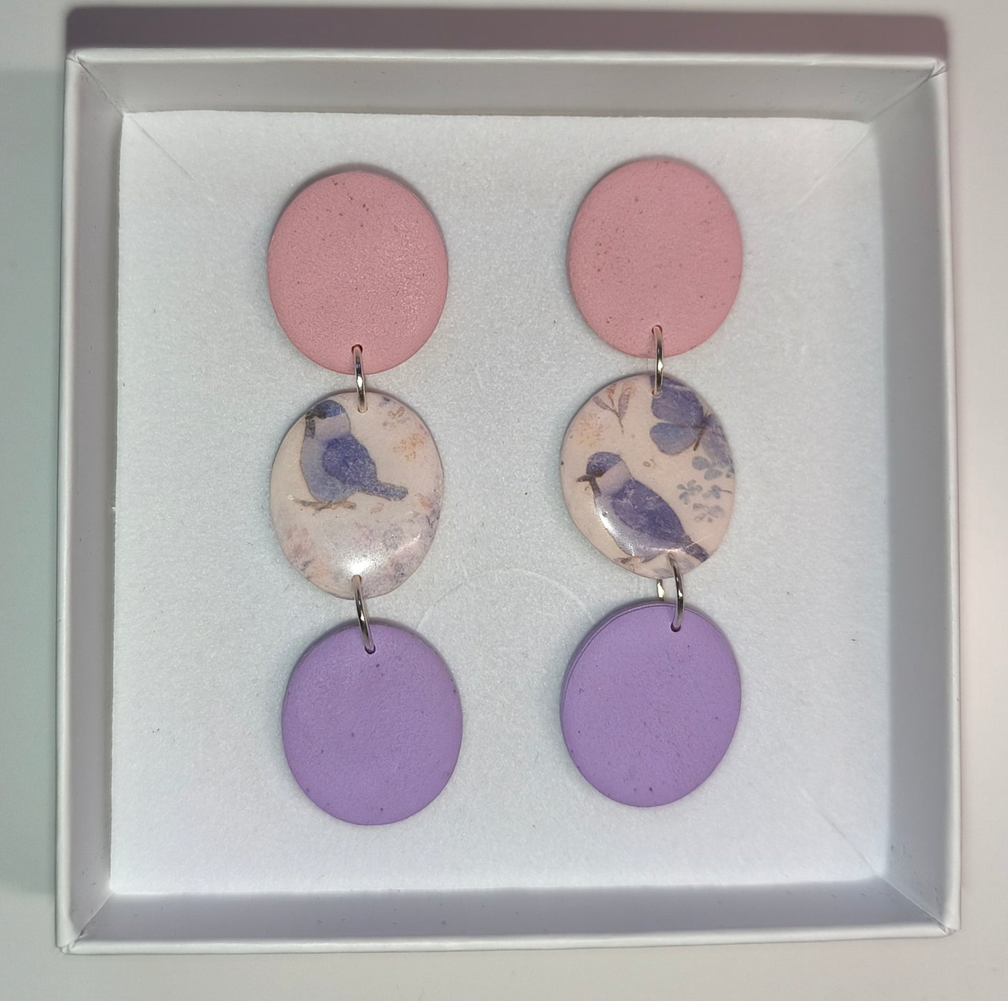 Disco pájaros rosa-lila