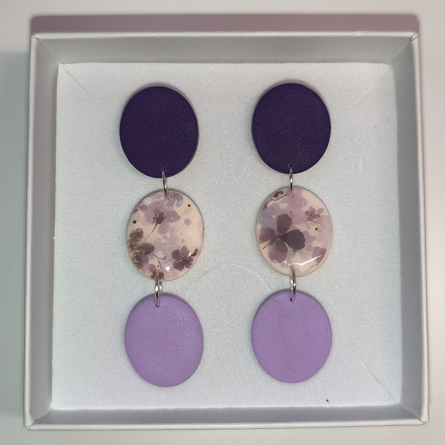 Disco floral morado-lila