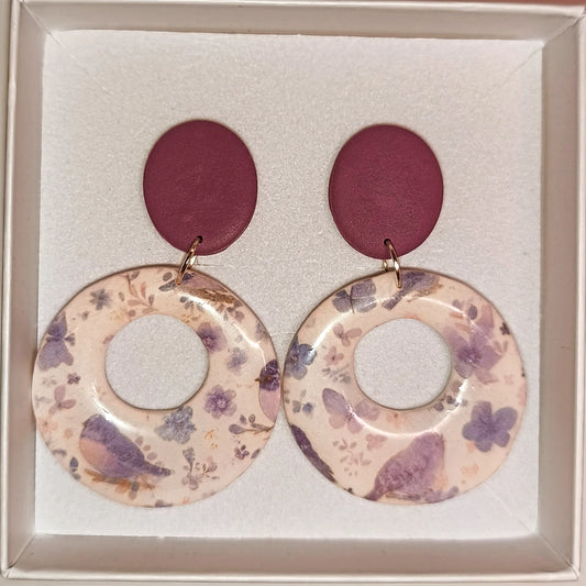 Círculo pájaros morado