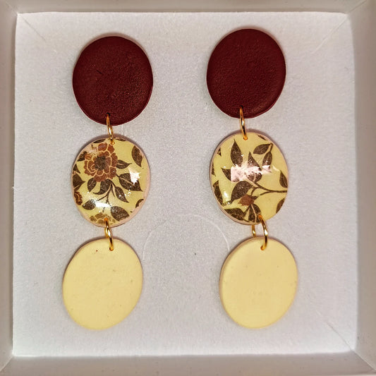 Disco floral granate-amarillo