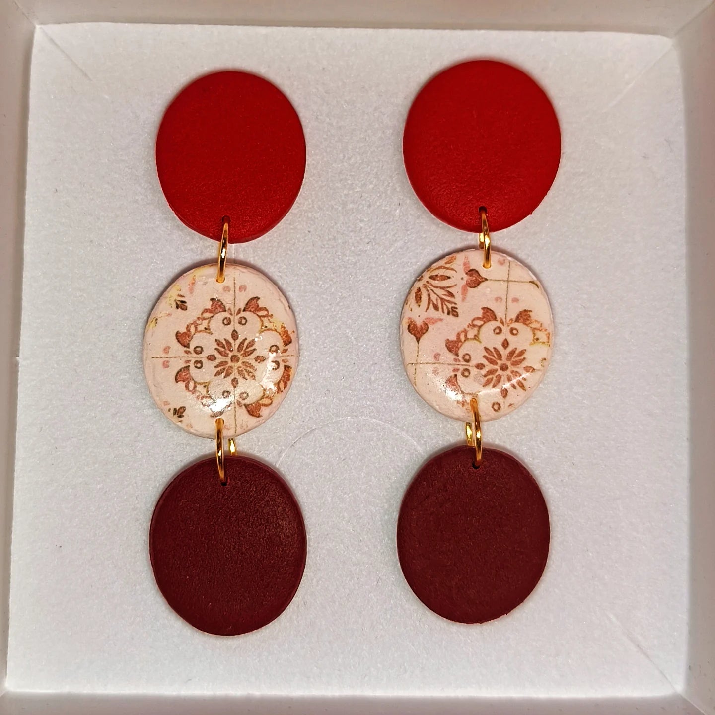 Disco mosaico rojo-granate