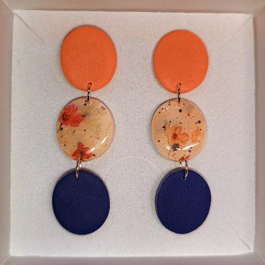 Disco floral naranja-azul