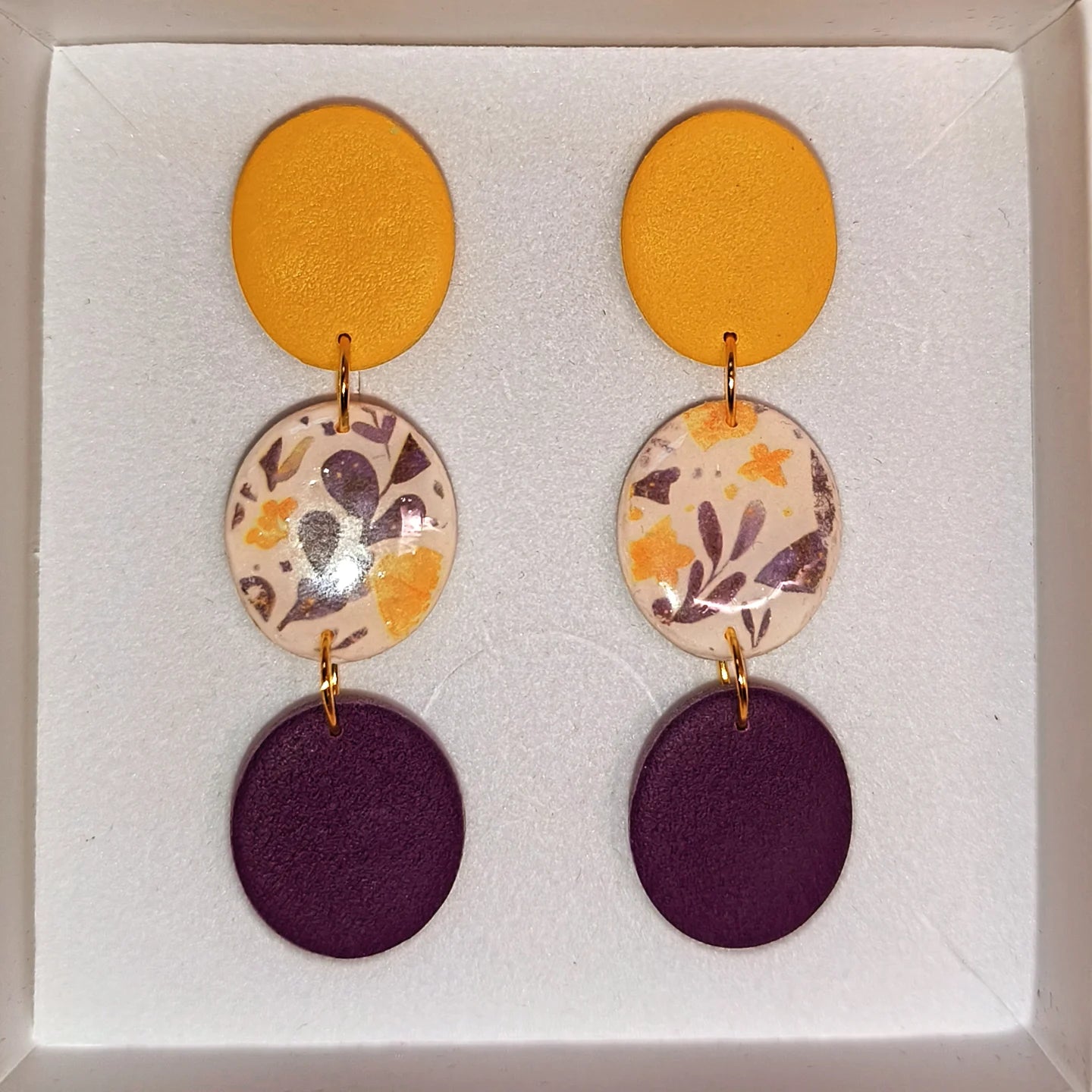 Disco floral mostaza-morado